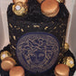 A 'Versace e' themed cake, covered with ferrero rochier treats!