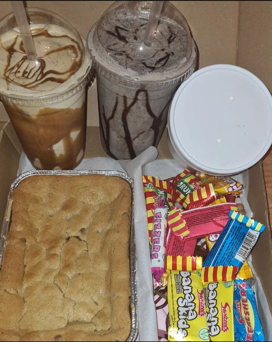 The movie box consists of - two milkshakes of your choice, along with either a brownie or blondie tray as well as sweets and ice cream!