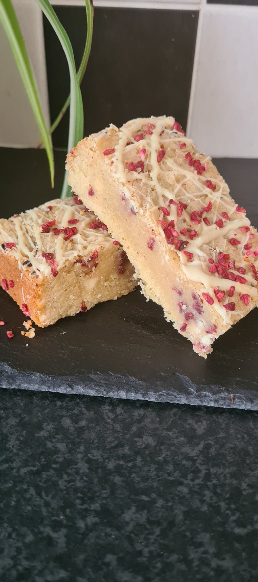 Our white chocolate raspberry ripple blondie. Topped with some raspberry flakes